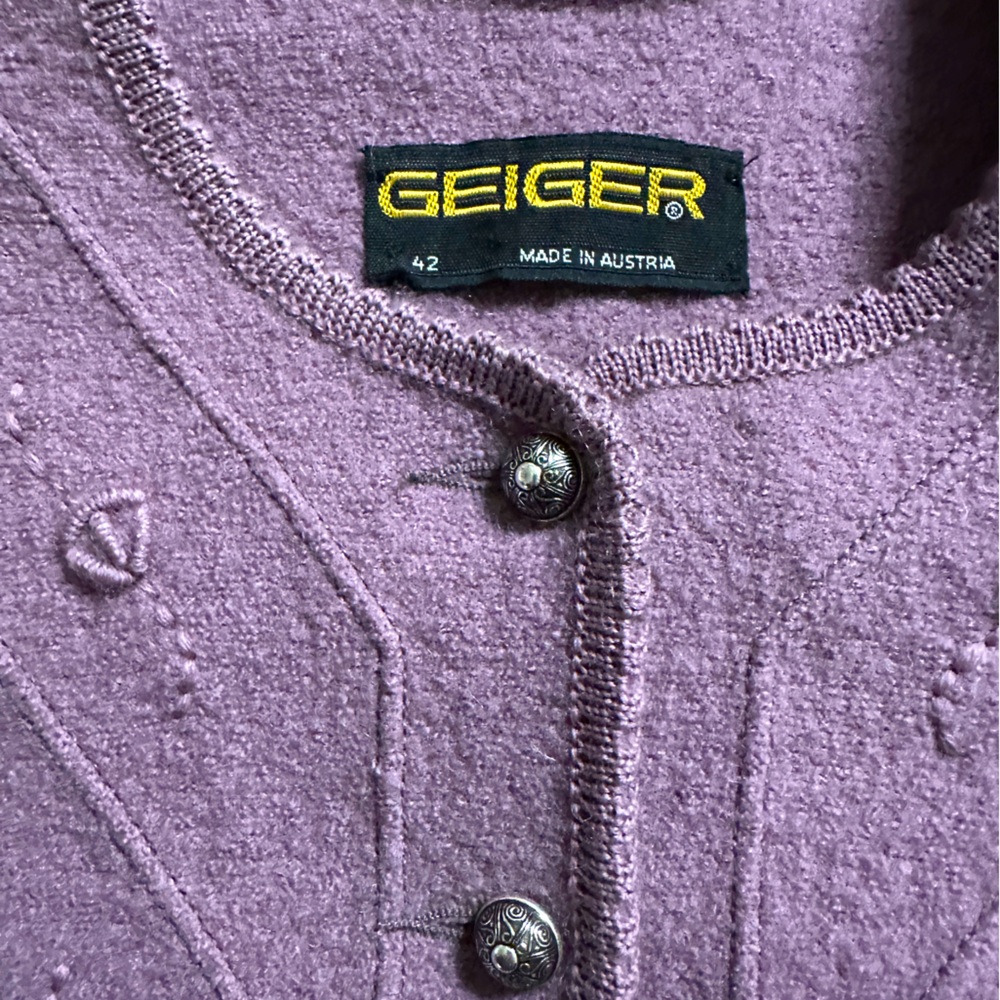 A boiled wool, sweater, jacket in a pale lilac  shade by Geiger, made Australia